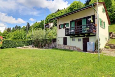 Un écrin de quiétude face au lac de la Gruyère – Chalet individuel à La Berra
