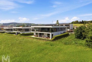 Un écrin d’exception au cœur de la Gruyère – Élégant appartement haut de gamme de 4,5 pièces avec jardin privatif