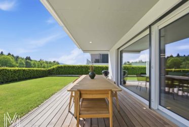 Un écrin d’exception au cœur de la Gruyère – Élégant appartement haut de gamme de 4,5 pièces avec jardin privatif